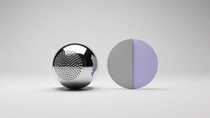 A chrome sphere covered in repeated tiny shapes beside a hand-cut paper disc, half grey and half violet